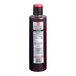 A close-up of a SHOTT Three Berry Real Fruit Flavoring Syrup bottle with a red lid.