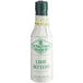 A white Fee Brothers bottle of lime bitters with a green logo.