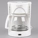 A white coffee maker with a Proctor Silex glass carafe.