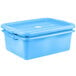 A Vollrath Traex blue polypropylene container with two lids.