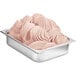A tray of pink ice cream with swirls of Fabbri Wild Fruits flavoring paste.