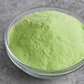 A bowl of green Fanale Honeydew powder.