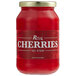 A red jar of Regal Maraschino Cherries without stems with white text.