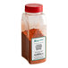 A case of Regal Ground Cayenne Pepper with a close-up of a container of red powder.