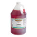 A plastic jug of Hawaiian Shaved Ice Strawberry Snow Cone Syrup.
