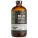 A close up of a brown 18.21 Bitters bottle with a label saying "Blood Orange & Ginger Shrub"