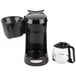 A black Hamilton Beach coffee maker with a clear glass container.