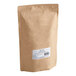 A brown bag of Numi Organic Moroccan Mint Loose Leaf Tea with a white label.