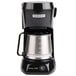 A Hamilton Beach coffee maker with a stainless steel pot.