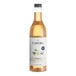 A bottle of Capora Sugar Free Vanilla Flavoring Syrup with a label.