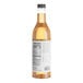 A close up of a bottle of Capora Sugar Free Vanilla Flavoring Syrup with a white label.