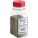 A clear jar of Regal Herbs de Provence seasoning with a red lid containing green herbs.