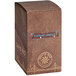 A brown David Rio box of 12 Elephant Vanilla Chai Tea Latte single serve packets with a logo.