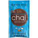 A blue David Rio package of 12 vanilla chai tea latte packets with a brown label.