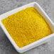 A white square bowl with Regal Seasoned Salt in it.
