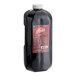 A large black plastic bottle of Tiki Breeze Coffee Pop Energy concentrate with a red label.