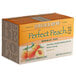 A case of 6 Bigelow Perfect Peach Herbal Tea boxes on a counter.
