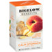 A box of Bigelow Benefits Ginger and Peach Herbal Tea Bags with a picture of ginger and a peach.