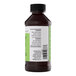 A brown plastic bottle of LorAnn Oils Pistachio Bakery Emulsion, 4 fl. oz. size.