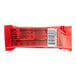 A close-up of a red FULFIL chocolate peanut butter protein bar package.