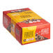 A case of 12 FULFIL chocolate peanut butter protein bars on a store shelf.