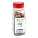 A jar of brown Regal whole nutmeg with a red lid.