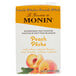 Monin Peach Fruit Smoothie Mix carton with a close-up of a peach.