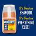 A close-up of a case of Old Bay Seasoning containers.