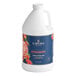 A white Capora jug of strawberry smoothie mix with a blue label.