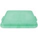 A Vollrath green plastic lid for a food storage box.