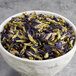 A bowl of Wild Hibiscus dried Butterfly Pea flowers.