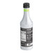 A white Monin bottle of Cucumber Concentrated Flavor with a black label.