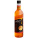 A close up of a bottle of DaVinci Gourmet Classic Orange Flavoring syrup.