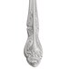 A Oneida Rosewood stainless steel bouillon spoon with a silver handle.