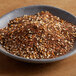 A bowl of Regal Salad Seasoning on a table.