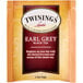 A white and blue Twinings Earl Grey Tea bag packet.