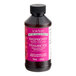 A 4 fl. oz. bottle of LorAnn Raspberry Bakery Emulsion with a white label.