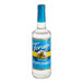 A close-up of a Torani Sugar-Free Peppermint Flavoring Syrup bottle with a blue label.