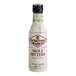 A white Fee Brothers Mole Bitters bottle with red text.