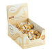 A white box of Lindt Lindor white chocolate truffles with gold foil.