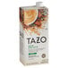 A white box of Tazo Decaf Chai Tea Latte concentrate with a white label.