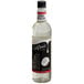 A close up of a bottle of DaVinci Gourmet Classic Coconut Flavoring Syrup with a label on it.