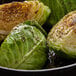 A head of cabbage with Regal caraway seeds on it.