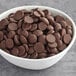 A bowl of Callebaut dark chocolate chips.