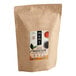 A brown bag of Numi Organic Breakfast Blend loose leaf tea with a label.