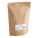 A brown bag of Numi Organic Breakfast Blend Loose Leaf Tea with a white label.