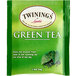 A green Twinings packet of green tea with a green leaf.