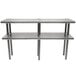 A stainless steel Advance Tabco double deck overshelf on a table.