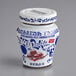 A white jar of Fabbri Amarena Cherries with blue and white design and a lid.