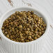 A bowl of Regal green peppercorns.